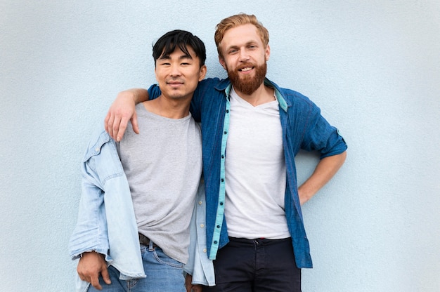 Front view men posing together