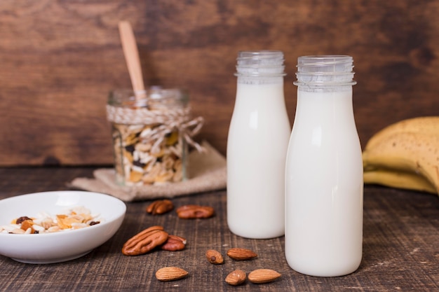 Front view milk bottles on the table