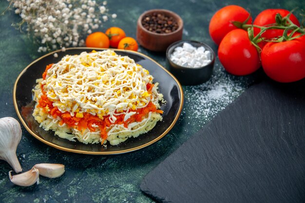 front view mimosa salad inside plate with seasonings and red tomatoes on dark blue surface kitchen photo cuisine birthday color food holiday meal