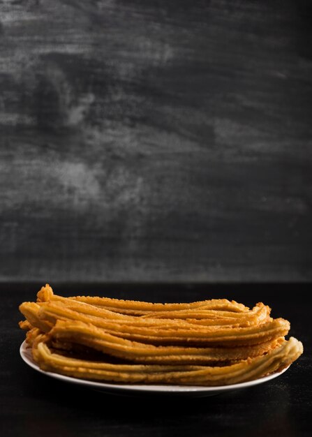 Front view minimalist churros plate with copy space