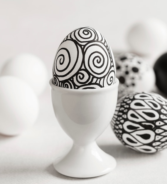 Front view of monochrome egg for easter in egg cup