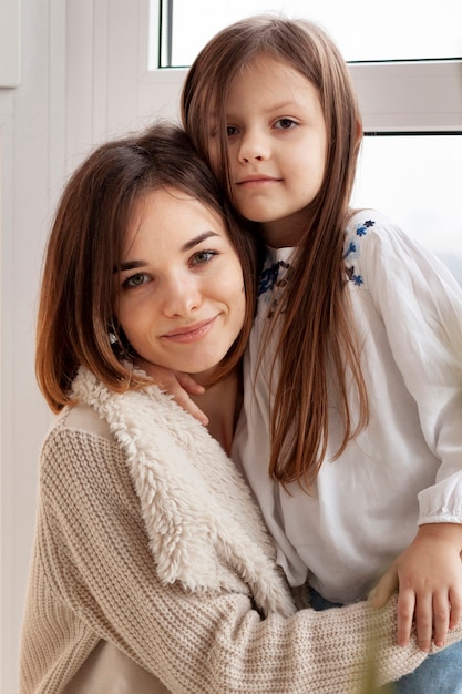 Front view mother and daughter