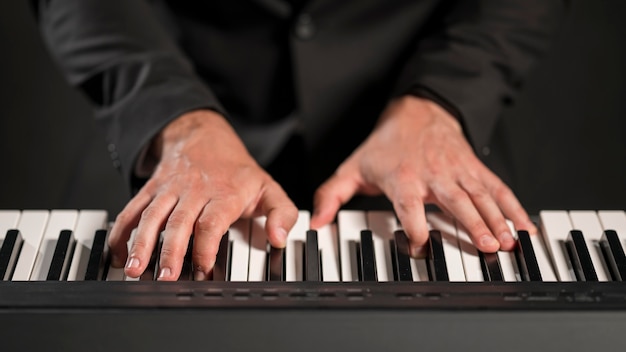 Front view musician playing keyboards