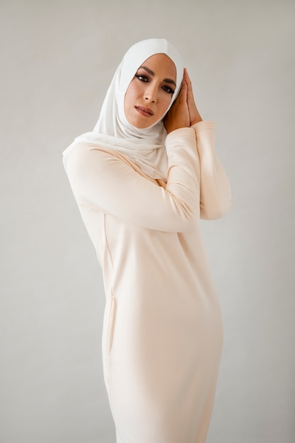 Free photo front view muslim woman wearing hijab