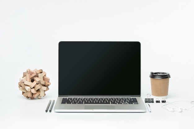 front view of notebook and cup of coffee. Inspiration and mock-up concept