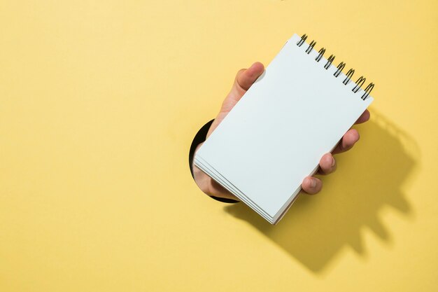 Front view notebook with yellow background