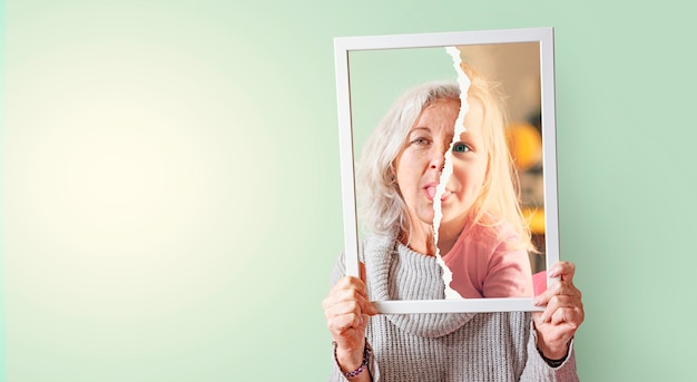 Free photo front view old woman and young girl