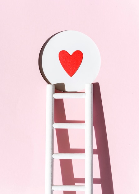 Front view of paper heart with ladder