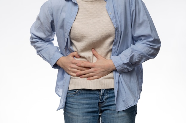 Front view patient experiencing abdominal pain