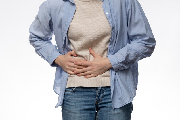 Front view patient experiencing abdominal pain