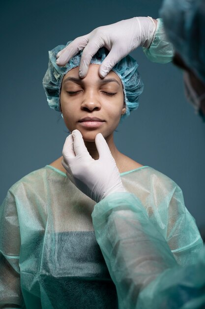 Front view patient wearing hospital gown