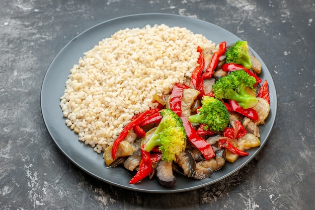 Front view pearl barley with cooked vegetable