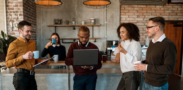 Front view of people meeting over a cup of coffee