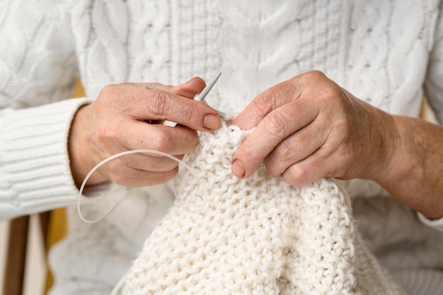 Front view of person crocheting