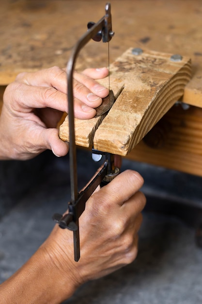 Front view person working on wood