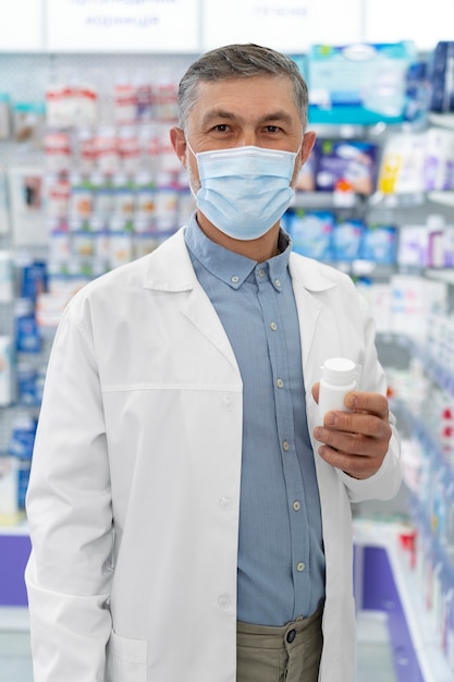 Front view pharmacist wearing face mask