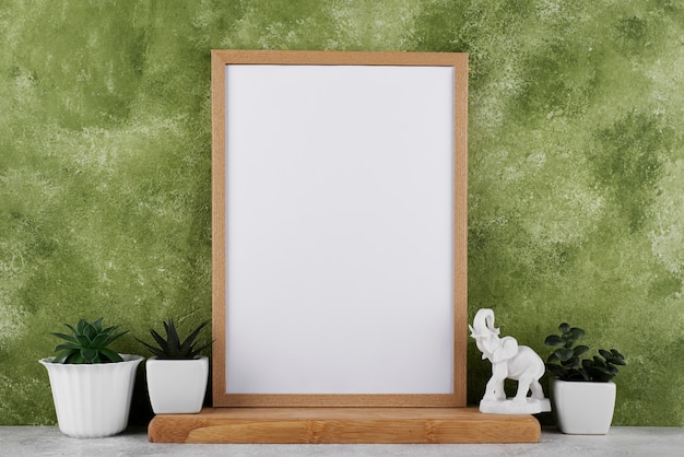 Free photo front view of photo frame as interior decoration