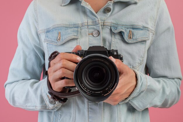 Front view photographer with camera