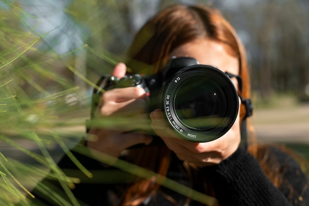 Front view photographer with camera