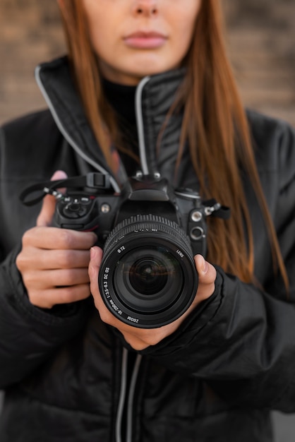 Front view photographer with camera