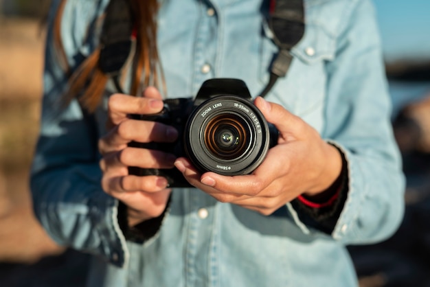 Front view photographer with camera