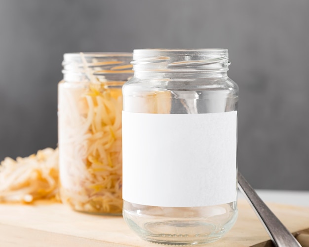 Front view of pickled vegetables in jars