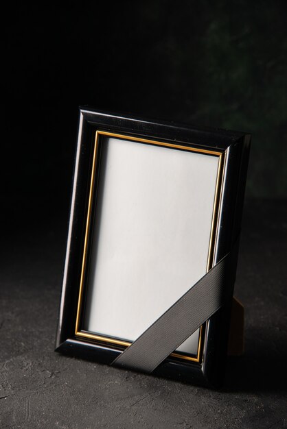 Free photo front view of picture frame on dark