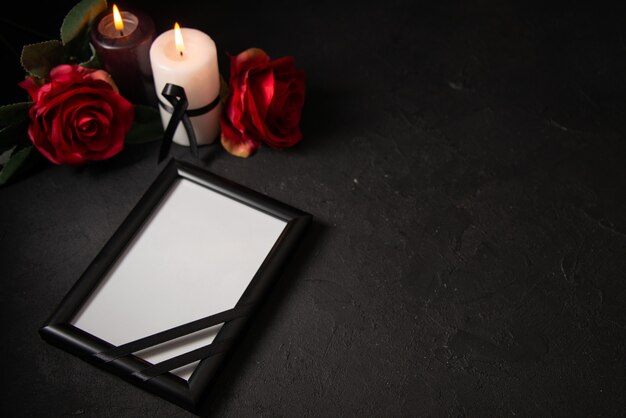 Front view of picture frame with red flowers on black