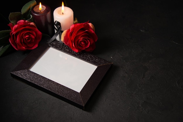 Front view of picture frame with red flowers on black