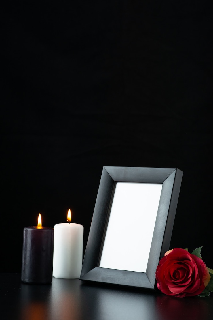 Free Photo front view of picture frame with red rose on black