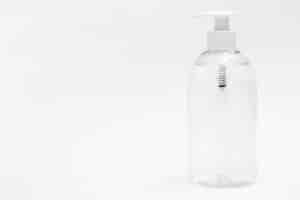 Free photo front view of plastic bottle with liquid soap and copy space