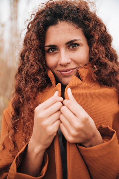 Front view portrait of a redhead woman