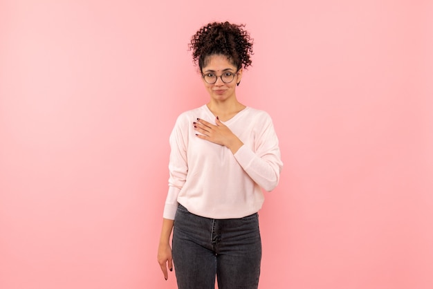 Free photo front view of pretty female delighted on pink