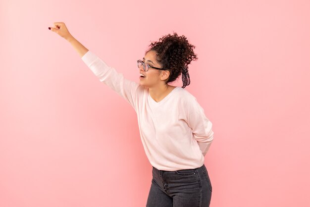 Free photo front view of pretty female excited on pink