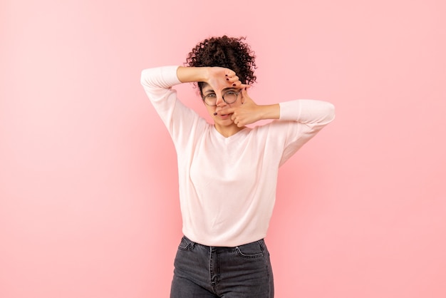 Free photo front view of pretty female on pink