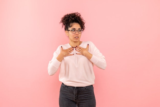 Free photo front view of pretty female on pink