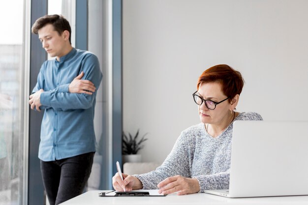 Front view of psychologist with patient