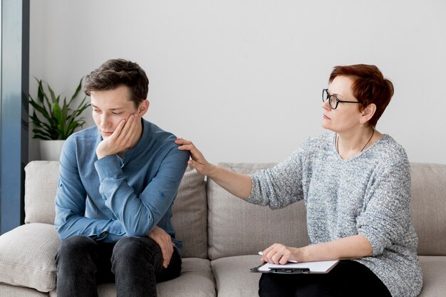 Front view of psychologist with patient