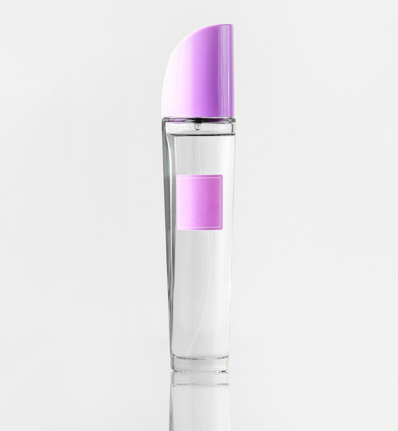 Free photo a front view purple and silver for cosmetics isolated on the white floor