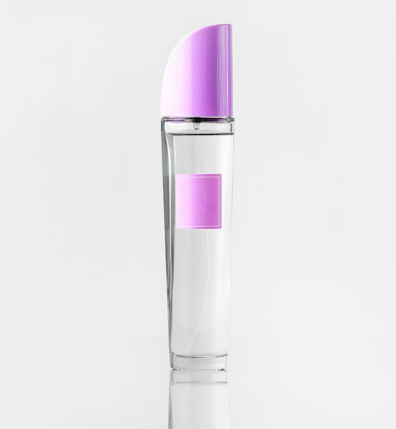 A front view purple and silver for cosmetics isolated on the white floor