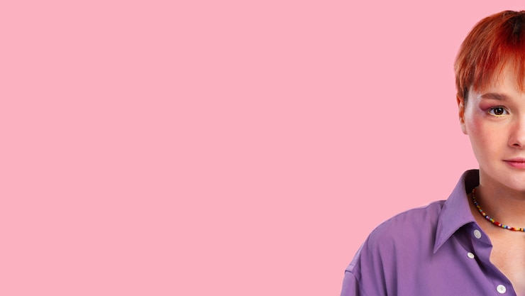 Free Photo front view queer woman posing in studio
