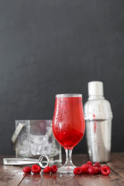 Free photo front view of raspberry cocktail glass