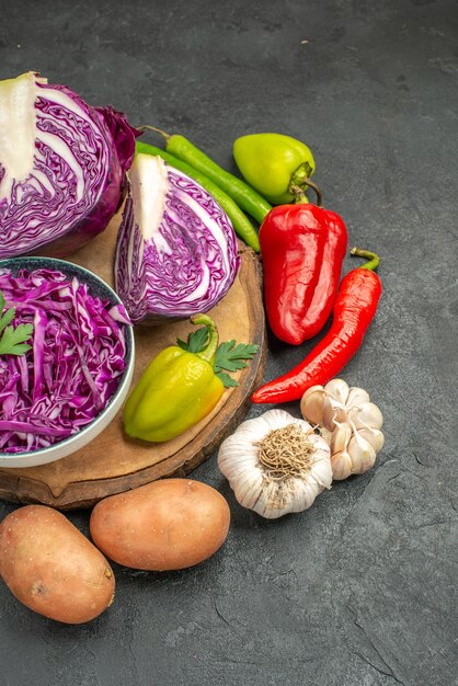 Front view red cabbage with fresh vegetables on the grey table ripe diet health salad