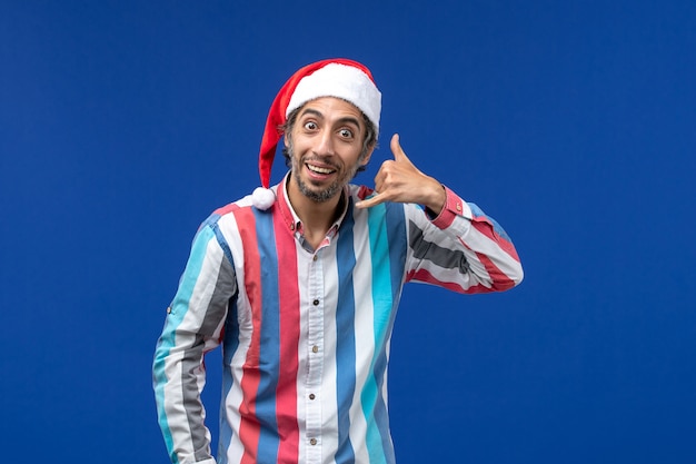 Free photo front view regular male with red christmas cap, santa emotion holiday