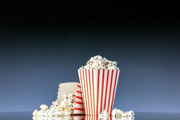 Free photo front view retro cinema buckets of popcorn on dark