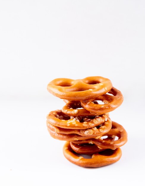 Front view salted bagels on a white background