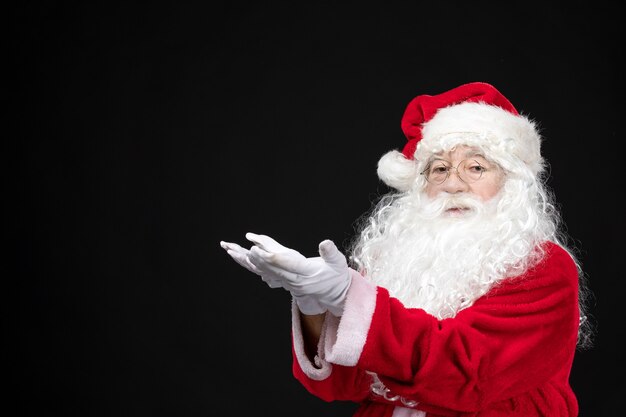 Front view santa claus in classic red suit