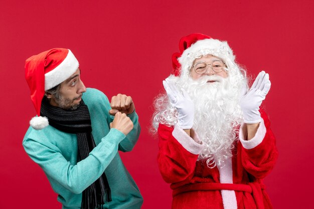 Front view santa claus with young male just standing