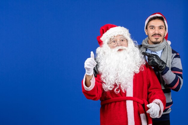 Front view santa claus with young male