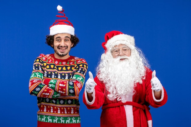 Front view santa claus with young male